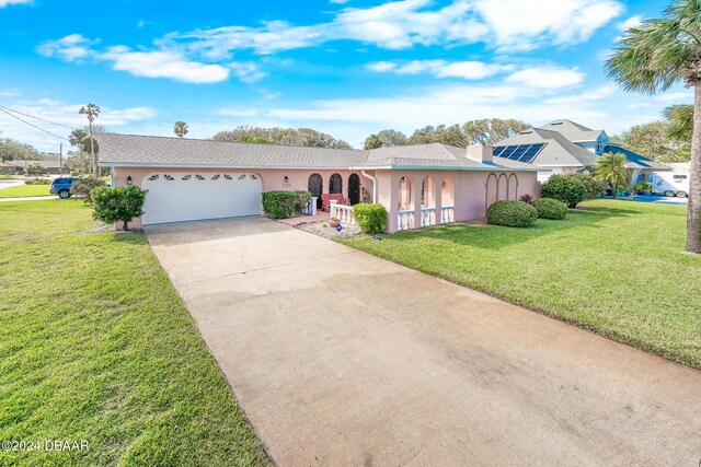110 Ponce Terrace Cir, Ponce Inlet, FL 32127 - ranch-style house featuring stucco siding, a garage, driveway, a porch, and a front lawn