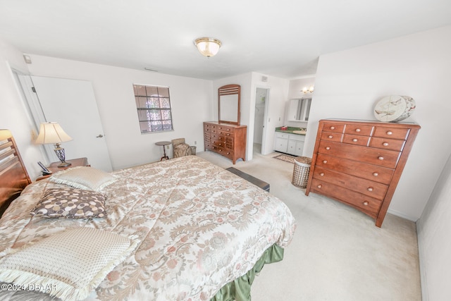 bedroom with light carpet