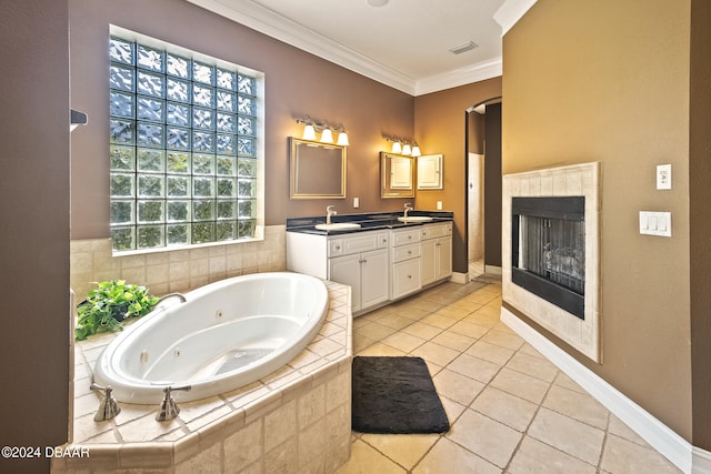 bathroom featuring ornamental molding, a wealth of natural light, vanity, and tile patterned floors