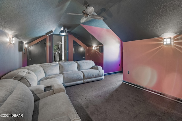 cinema room featuring carpet, a textured ceiling, vaulted ceiling, and ceiling fan