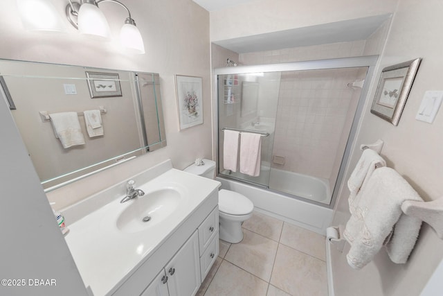 4777 S Atlantic Ave Unit B2, Ponce Inlet, FL 32127 - bathroom featuring vanity, toilet, enclosed tub / shower combo, and tile patterned floors