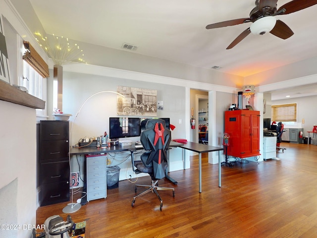 office space with ceiling fan and wood-type flooring