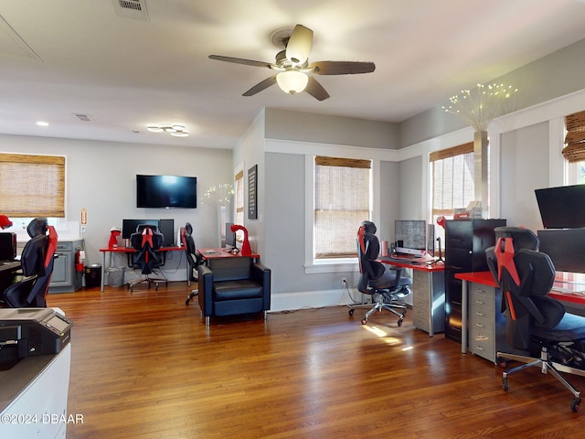 office space featuring wood-type flooring and ceiling fan