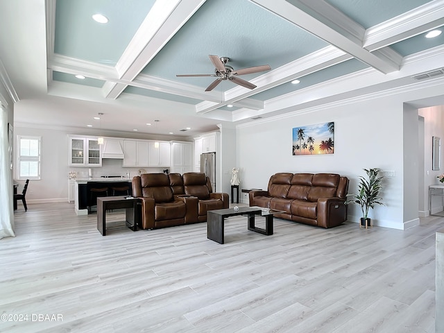 living room with light hardwood / wood-style floors, crown molding, and coffered ceiling