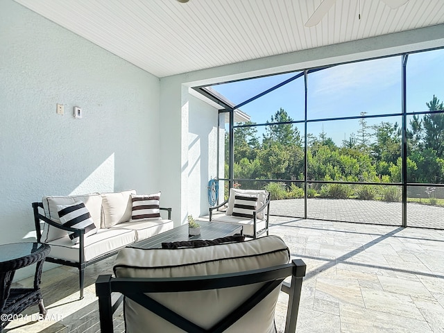 sunroom / solarium featuring a healthy amount of sunlight