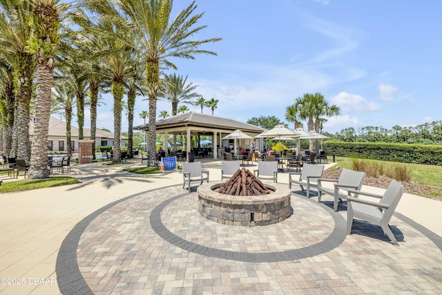 110 Longridge Ln, Ormond Beach, FL 32174 - view of patio featuring a gazebo and a fire pit