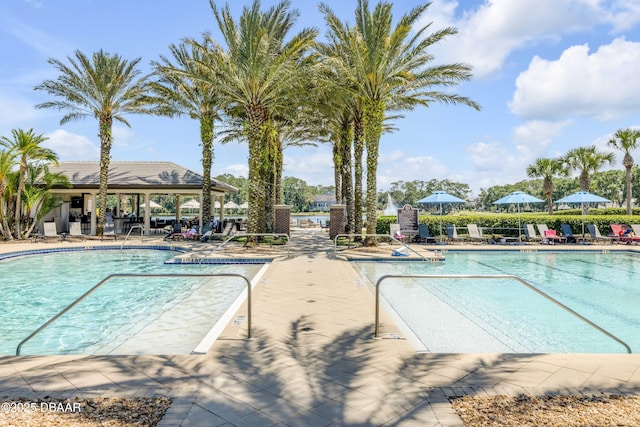 110 Longridge Ln, Ormond Beach, FL 32174 - community pool featuring a patio area and a gazebo