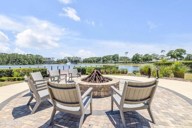 110 Longridge Ln, Ormond Beach, FL 32174 - view of patio with an outdoor fire pit and a water view