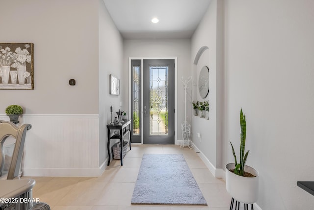 110 Longridge Ln, Ormond Beach, FL 32174 - tiled entrance foyer featuring wainscoting and baseboards