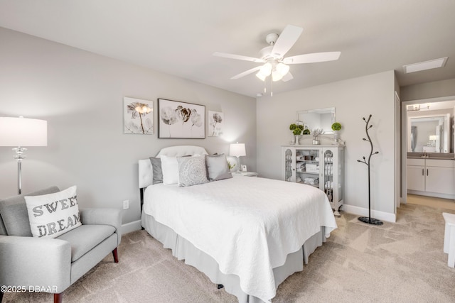 110 Longridge Ln, Ormond Beach, FL 32174 - bedroom with light colored carpet, baseboards, ceiling fan, and a sink
