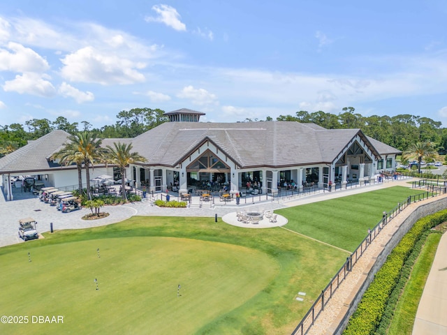 110 Longridge Ln, Ormond Beach, FL 32174 - surrounding community featuring a putting area, a patio, and view of golf course