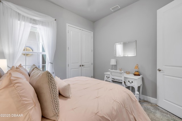 110 Longridge Ln, Ormond Beach, FL 32174 - bedroom featuring light carpet, a closet, and baseboards
