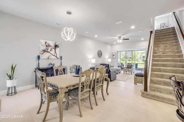 110 Longridge Ln, Ormond Beach, FL 32174 - dining room with stairs, ceiling fan, light tile patterned flooring, recessed lighting, and a chandelier