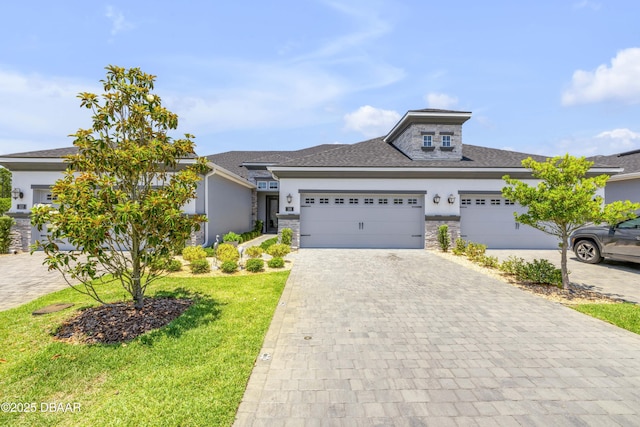 110 Longridge Ln, Ormond Beach, FL 32174 - view of front of property featuring stucco siding, stone siding, decorative driveway, and a front lawn