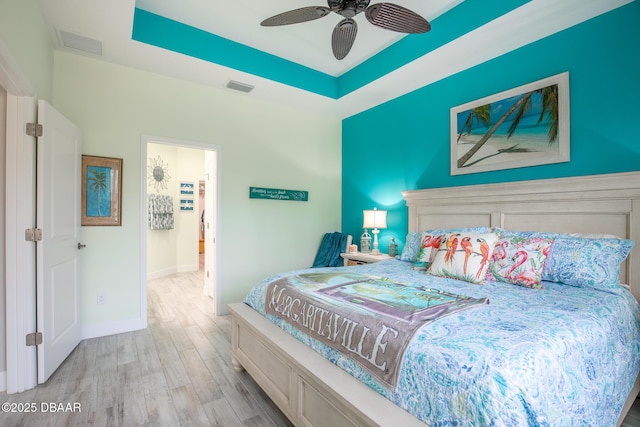 bedroom featuring ceiling fan and light wood-type flooring