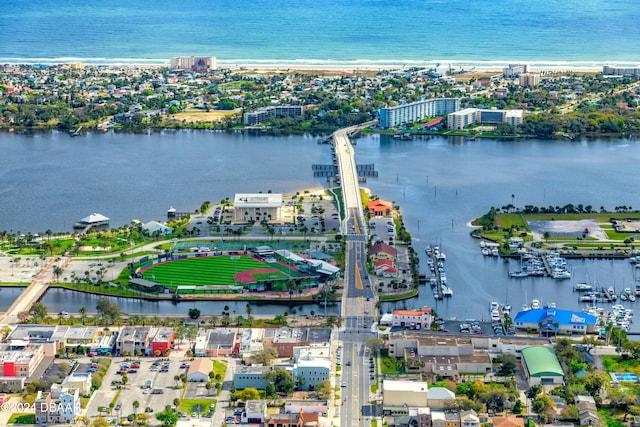 birds eye view of property featuring a water view