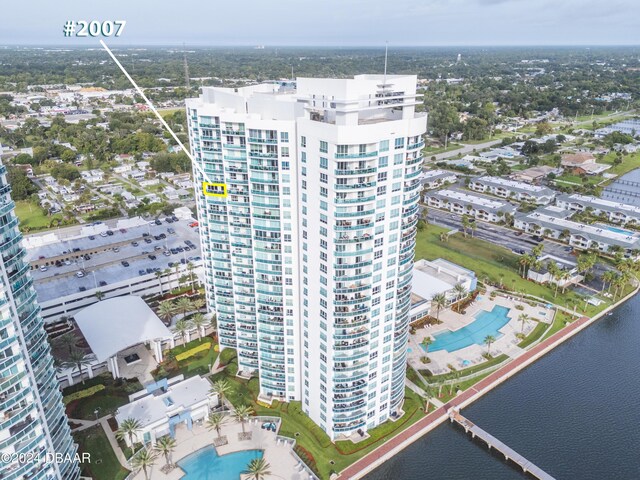 241 Riverside Dr Unit 2007, Holly Hill, FL 32117 - aerial view of a pool area, apartment complex / building, and a large body of water