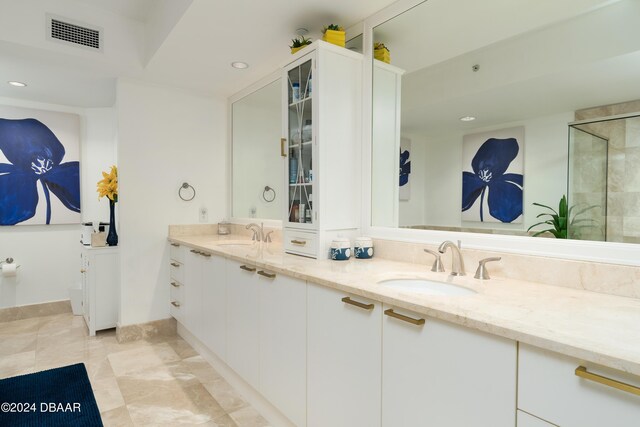 241 Riverside Dr Unit 2007, Holly Hill, FL 32117 - bathroom with double vanity, recessed lighting, and an enclosed shower