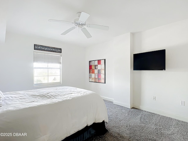 3145 S Atlantic Ave Unit 405, Daytona Beach, FL 32118 - carpeted bedroom with baseboards and a ceiling fan