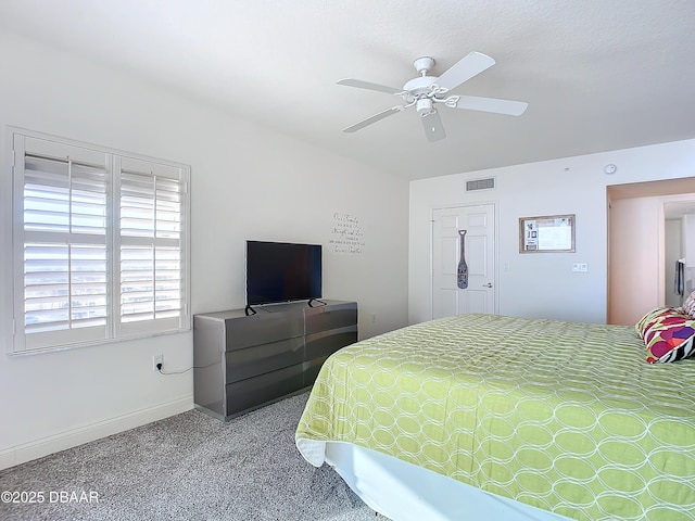 3145 S Atlantic Ave Unit 405, Daytona Beach, FL 32118 - bedroom with carpet, baseboards, and ceiling fan