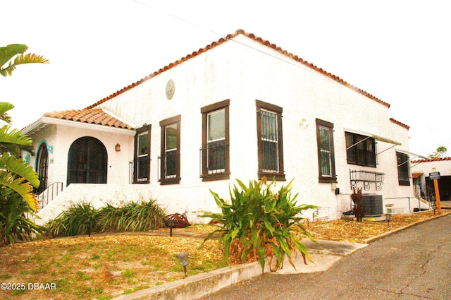 view of home's exterior featuring cooling unit