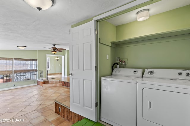 laundry room with a ceiling fan, light tile patterned flooring, a textured ceiling, laundry area, and independent washer and dryer