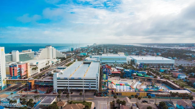 drone / aerial view with a view of city and a water view