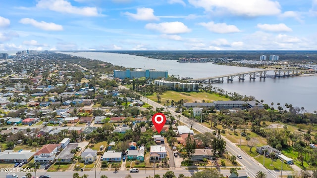 bird's eye view featuring a water view and a city view