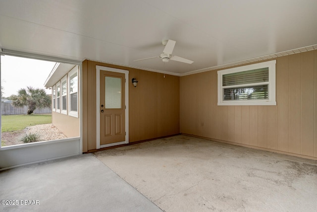 interior space featuring ceiling fan