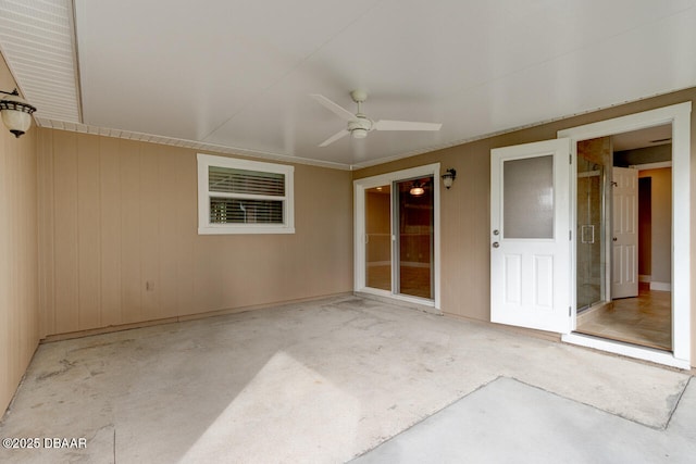 view of patio featuring ceiling fan