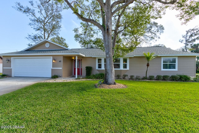 ranch-style home featuring a garage and a front lawn