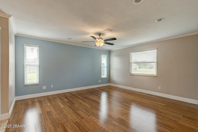 spare room featuring hardwood / wood-style flooring, crown molding, ceiling fan, and a textured ceiling