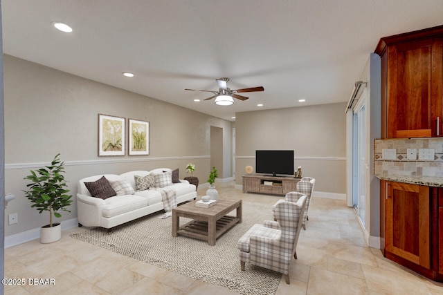 living room with ceiling fan