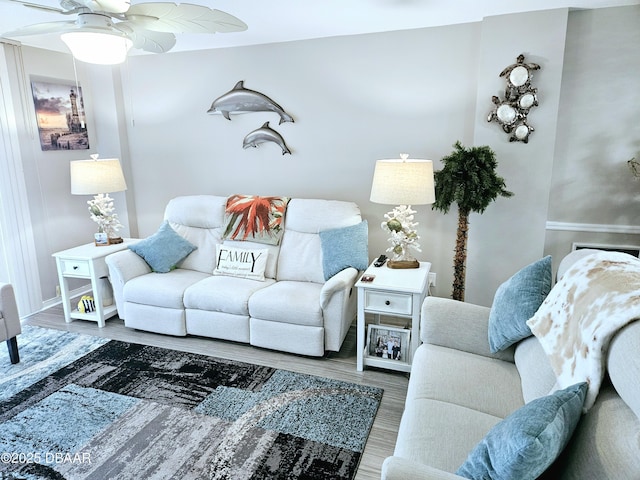 living room with hardwood / wood-style flooring and ceiling fan