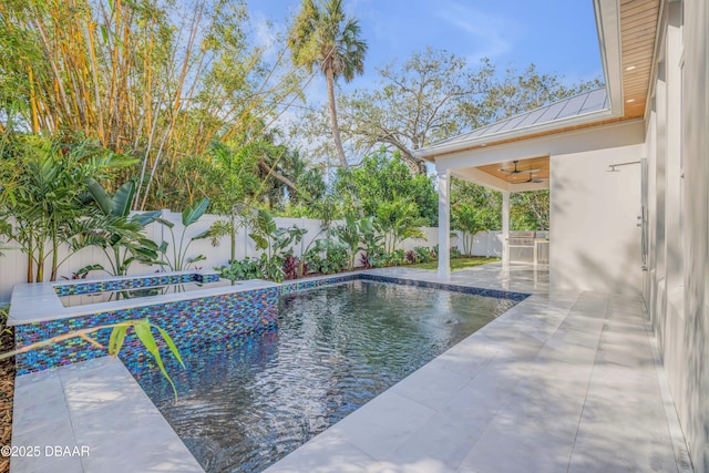 view of pool with a fenced in pool, a patio area, a fenced backyard, and ceiling fan