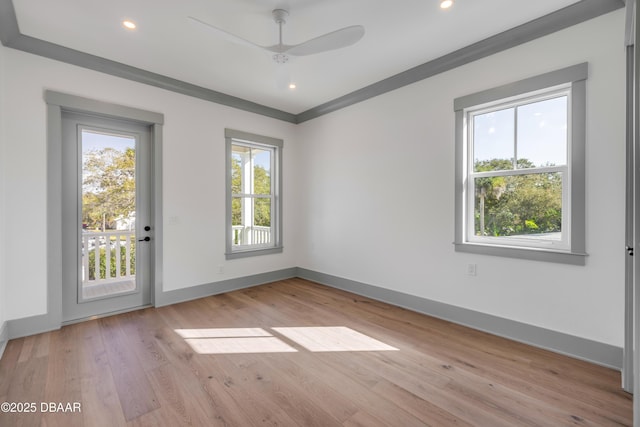 empty room featuring recessed lighting, light wood-style flooring, and baseboards