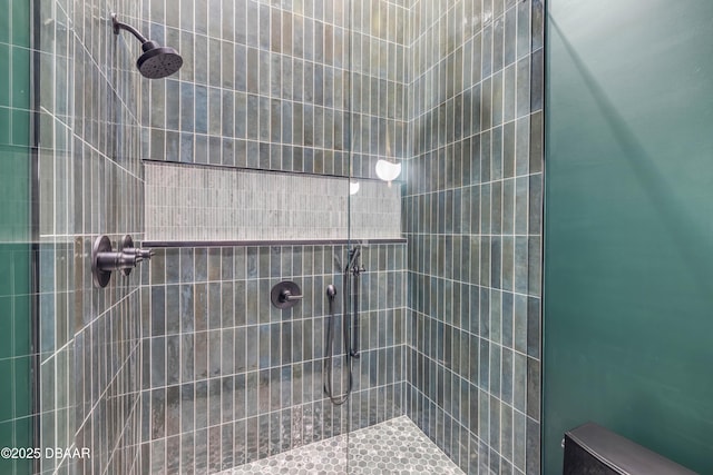 full bathroom with tiled shower