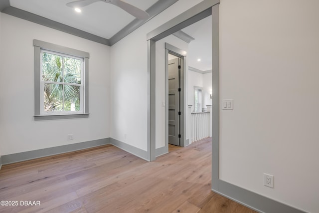 spare room featuring light wood-style floors, ceiling fan, baseboards, and recessed lighting