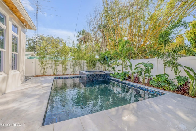 view of pool featuring a patio area, a fenced backyard, and a fenced in pool