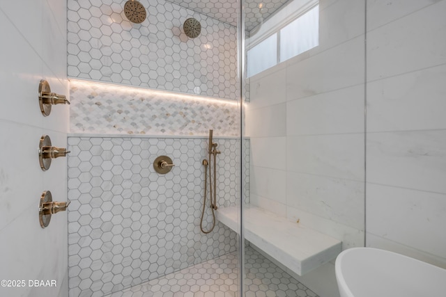 bathroom with a walk in shower and tile walls