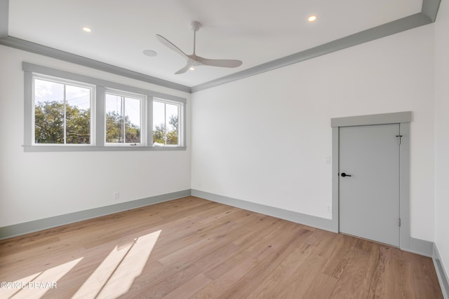 spare room with recessed lighting, baseboards, ceiling fan, and light wood finished floors