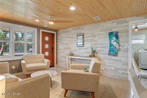 living room with wooden ceiling