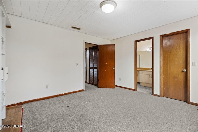 3548 Forest Branch Dr Unit C, Port Orange, FL 32129 - unfurnished bedroom featuring carpet and connected bathroom