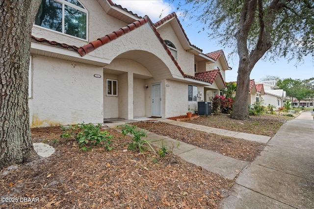 3548 Forest Branch Dr Unit C, Port Orange, FL 32129 - view of front of house with stucco siding and a tile roof