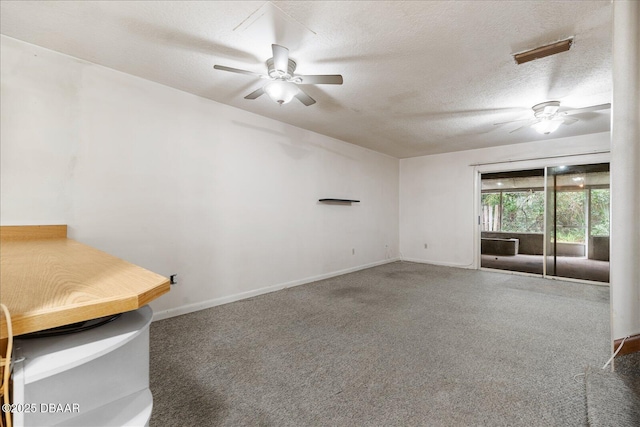 3548 Forest Branch Dr Unit C, Port Orange, FL 32129 - carpeted empty room with a ceiling fan and a textured ceiling