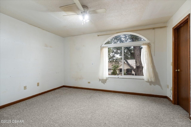 3548 Forest Branch Dr Unit C, Port Orange, FL 32129 - carpeted empty room with a textured ceiling and ceiling fan