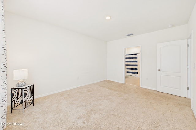 2625 Neverland Dr, New Smyrna Beach, FL 32168 - carpeted spare room featuring baseboards and visible vents