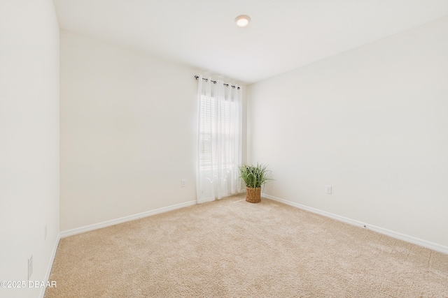 2625 Neverland Dr, New Smyrna Beach, FL 32168 - spare room with light carpet and baseboards