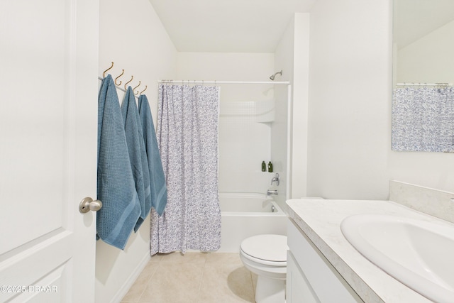 2625 Neverland Dr, New Smyrna Beach, FL 32168 - bathroom with tile patterned floors, shower / bathtub combination with curtain, vanity, and toilet