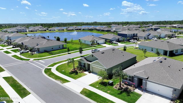 2625 Neverland Dr, New Smyrna Beach, FL 32168 - drone / aerial view featuring a water view and a residential view